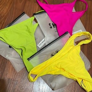 3 bright colored bikini bottoms. Size large